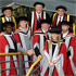 Chairman of the Governors, Sandy Anderson, Chancellor Lord Sawyer, Vice-Chancellor Professor Graham Henderson. Front row: Dr John Sentamu, Archbishop of York, Rob Smedley, Formula 1 engineer, Trevor Arnold MBE, former Managing Director K Home International, Adele Parks, novelist, Paul Rodgers, singer-songwriter.