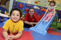 Pictured: Mahe Gladdon (centre) with children from Jack in the Box.