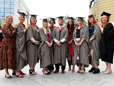 Jenny McKnight (first-left) and Linda Nelson (first-right) with some of the BMI Healthcare staff who graduated at Teesside University.. Link to Healthcare staff are the first to graduate from new programme .