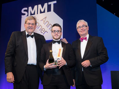 Teesside University graduate Tom Lingard, pictured centre, receiving his award. Link to View the pictures.