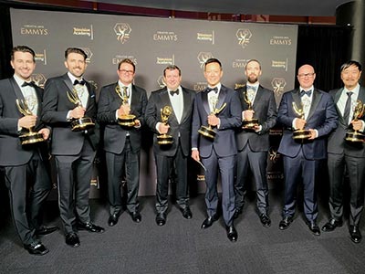 Nick Marshall, pictured far left, with some of the Emmy winning team. Link to View the pictures.