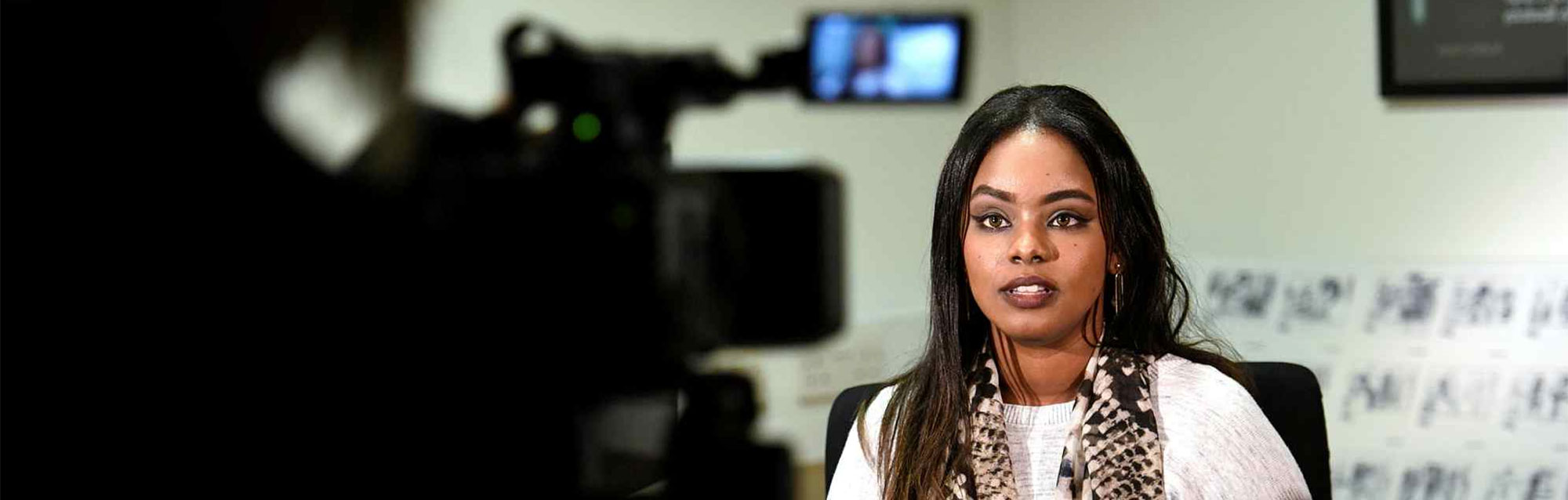 A student on the journalism course is interviewed as part of their degree in journalism.