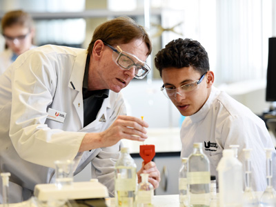 Dr Joe McGinnis with Nunthorpe Academy pupil Hassan Ben-Tiba. Link to Experiments provide a winning formula.