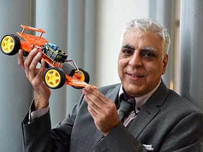 Anwar Bashir with the SmartCar. Link to Tech entrepreneur creates educational tool with help from Innovate Tees Valley.