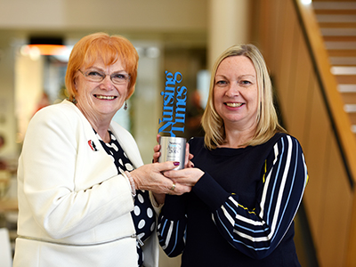 Helen Scullion (right) with Marion Grieves, Dean of the School of Health & Social Care Helen Scullion (right) with Marion Grieves, Dean of the School of Health & Social Care