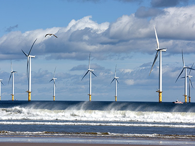Link to Pioneering project could help Government meet wind power pledge.