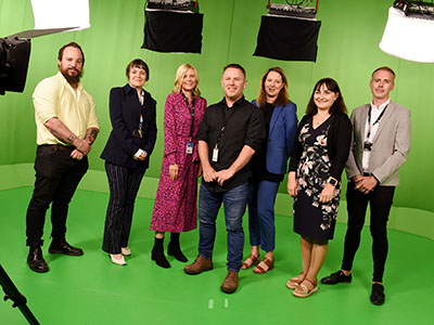 Representatives from Teesside University and Signpost Productions in the green screen studios at Teesside University. Link to Partnership to drive opportunities in the region’s broadcast sector.
