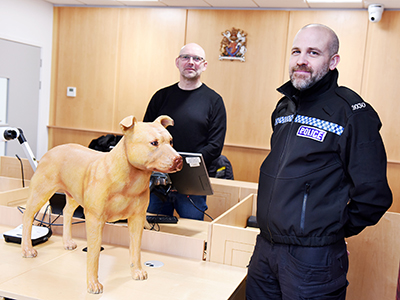 Stewart Dunderdale, Course Assessor from North Yorkshire Police, and Sergeant Mike Smith, from West Yorkshire Police dog section, at Teesside University’s mock courtroom.. Link to Teesside University assists with police officer training course.