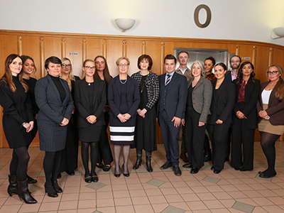 (Centre) Her Honour Judge Gillian Matthews KC, District Judge Sara Keating and His Honour Judge Harvey Murray together with staff and students from Teesside University Law Clinic at Teesside Combined Court Centre.. Link to Unique service offers support for people in family courts.