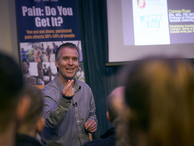 Professor Cormac Ryan, pictured at one of the Flippin Pain outreach tour events. Link to Professor Cormac Ryan, pictured at one of the Flippin Pain outreach tour events.