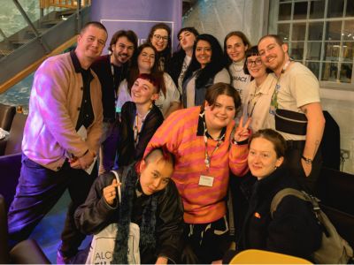 Teesside University students Elizabeth and Faiza pictured fifth and sixth from the back left respectively alongside other fellows (Credit: Sanne Gault for Alchemy Film & Arts). Link to Creative students went behind the scenes of renowned film festival.