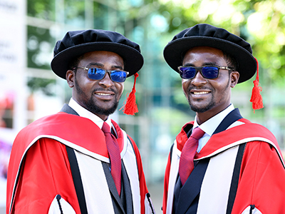 Hassan and Hussein Doma. Hassan and Hussein Doma. Link to Doctorate milestone shared by twin scholars.