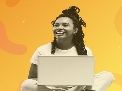 An image of a woman smiling, with a laptop on her knee. . Link to Adobe Express Student Academy (AXSA) Virtual Conference, 25th – 26th November..