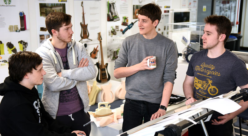 Ben Russi, centre, speaking to BA (Hons) Product design students Sam Henderson, Adam Evans and Jack Murphy.
