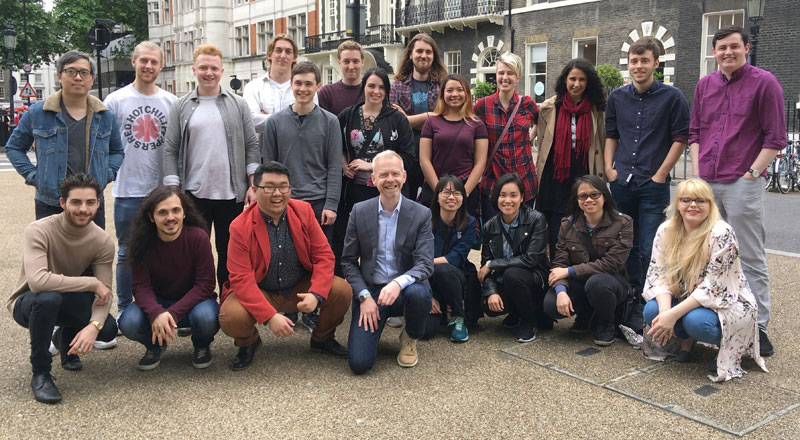 Justin Greetham, pictured centre, with students at ExpoTees London