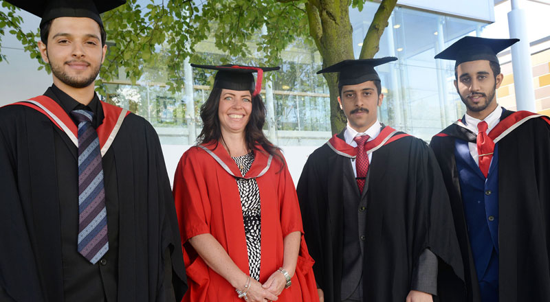 Teesside University academic Melanie Brown pictured with the graduates  