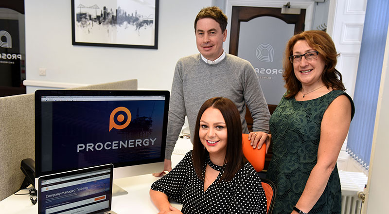 Rebecca Baker (seated) with Michael Styan and Joanne Rout.