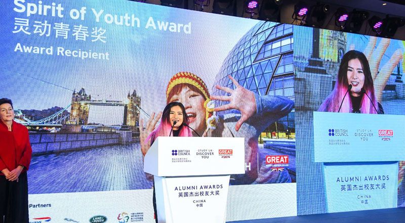 Zhao Jing, BA (Hons) Television and Film Production graduate, pictured in China receiving her Spirit of Youth Award