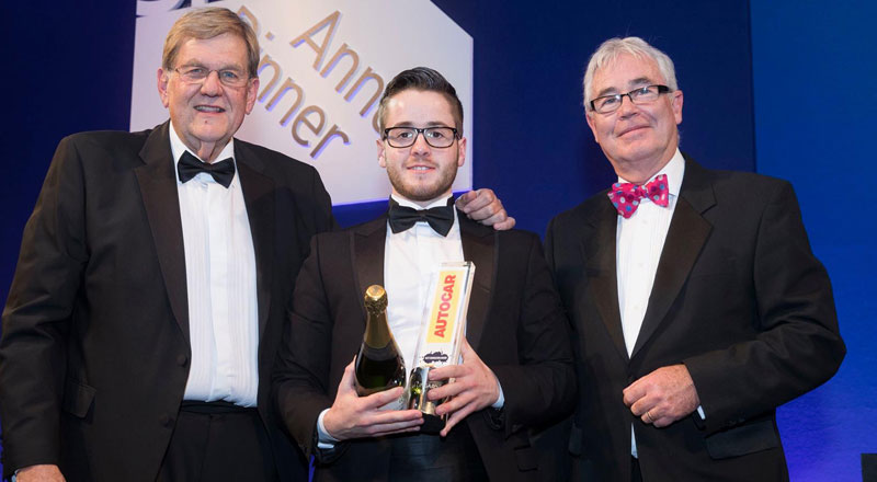 Teesside University graduate Tom Lingard, pictured centre, receiving his award