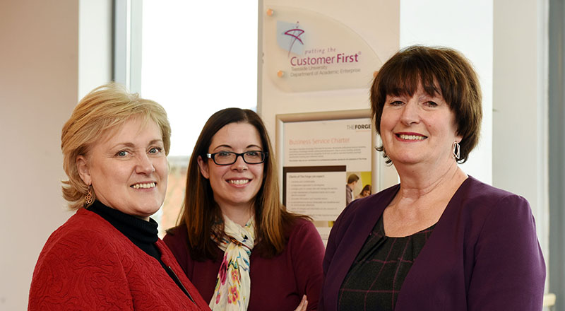 Teesside University has been awarded Putting the Customer First Accreditation for the fifth time. From left - Karen Race, Deputy Director of The Forge; Emma Hoang, Business Information Manager, and Laura Woods, Director of The Forge