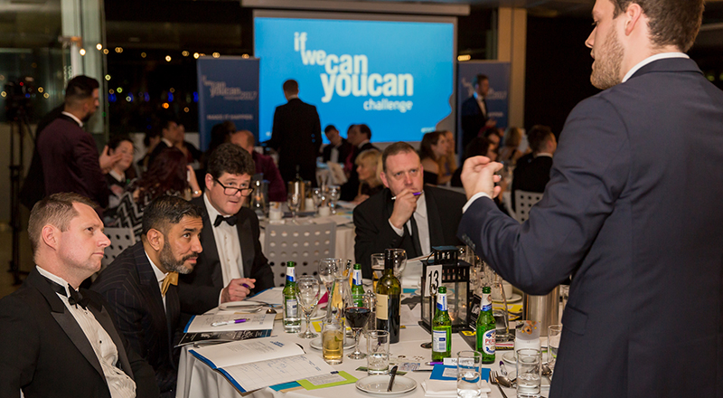 Last year’s competitor Jake Newport pitching his idea to a table of business professionals including Ammar Mizar CBE. 