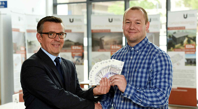 Chris Walker, Deputy Director, with prize winner Lewis Richardson