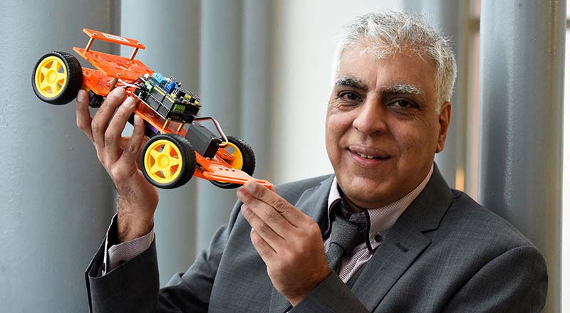 Anwar Bashir with the SmartCar