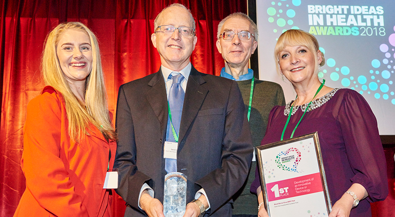 Dr David Chadwick and Professor Paul Van Schaik, (centre), receiving the Bright Ideas in Health Award