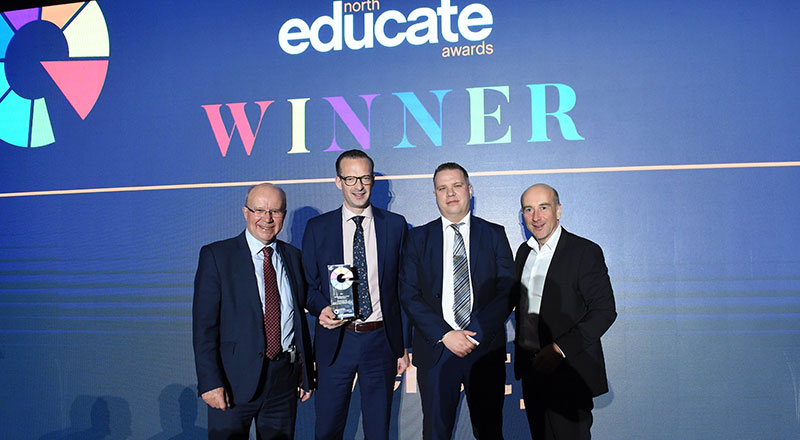 Professor Mark Simpson and Academic Registrar Jonathan Eaton (Centre), with event host and former BBC Political Editor Jim Hancock (left) and Mark Lee, CEO of category sponsors Communicorp, (right).

