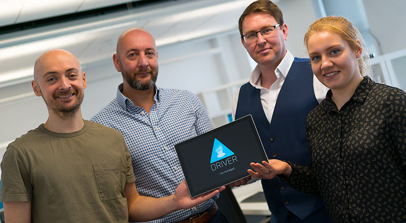 (L-R) Driver.Online's Finance Director Chris Davis, CEO Marc Atkinson and Chief Technology Officer Stephen Calvert with Camille Hilditch.