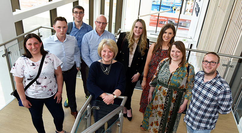 Professor Leni Oglesby with prize winners from over the years.