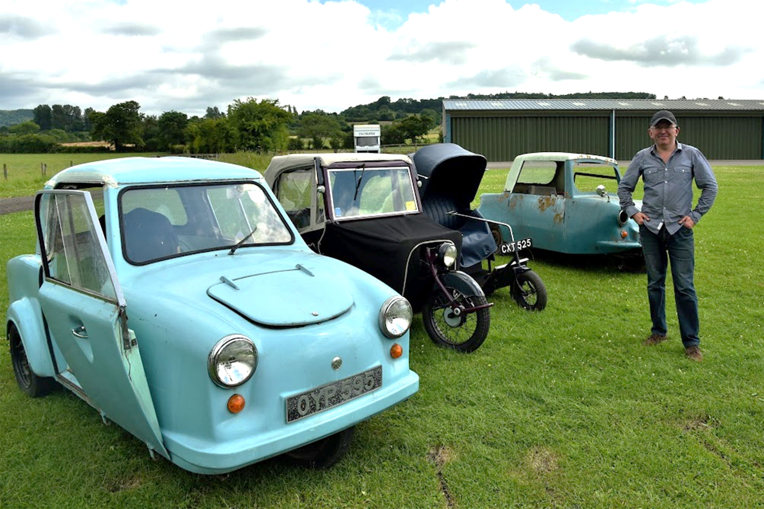 Simon McKeown, with some of his collection of invalid carriages 