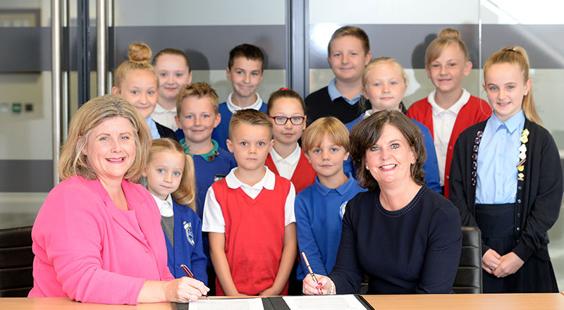 Katrina Morley, Chief Executive of Tees Valley Education and Professor Jane Turner OBE DL, Pro Vice-Chancellor (Enterprise & Business Engagement) at Teesside University, with pupils from Tees Valley Education.