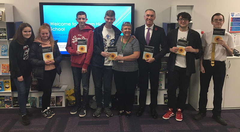 Professor Newbury-Birch, pictured at the launch of the book with Professor Croney and students from Norham High School. 