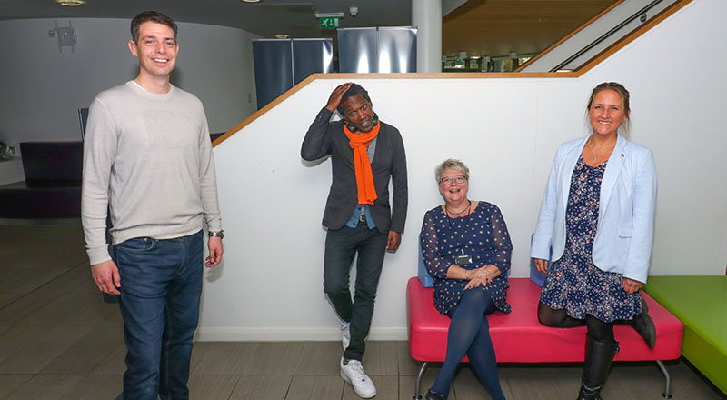 Poet Lemn Sissay (second left) with the organisers of the Hackathon (from left) David Dixon, Investment Manager at DigitalCity, Rachel Morris, Principal Lecturer in the School of Health & Life Sciences and Dr Daisy Best, Principal Lecturer in the School of Social Sciences, Humanities & Law. [Photo credit: Gordon Williams, neurologically-challenged.co.uk]