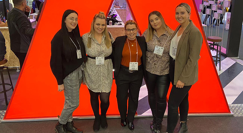 Principal lecturer Beverley Boden (centre) with the prize-winning students (from left) Billie-Jo Bowie, Abbie Waldby, Megan Maguire and Megan McCullow at the Bett Show.