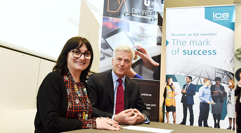 Sean Harris with Professor Chrisina Jayne. 