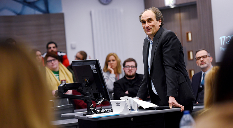 Mr Justice Jacobs talking to law and policing students at Teesside University