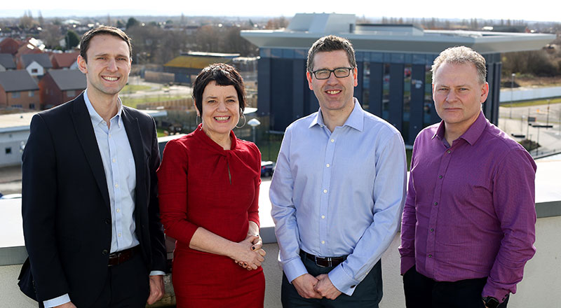 David Hughes and Siobhan Fenton, from Teesside University's School of Computing, Engineering & Digital Technologies, with Steve Jones and Alan Wardle from Siemens.