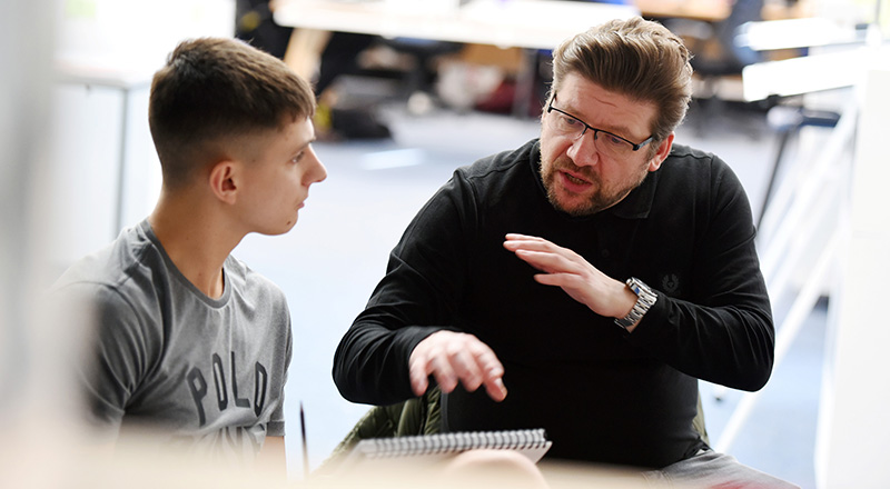 David Fox talking with design students at Teesside University.