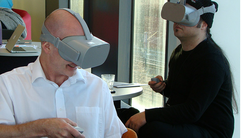 Professor Denis Martin (left) trying some of the VR technology