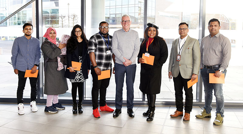 International Student Barometer prize draw winners with Dr David Bell.