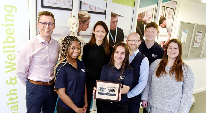 From left, Daniel Moore, student Emma Simpson, Faye Deane, student Kristina Saraci, clinic supervisor Ben Grant, student Aidan Heywood, and chiropractic lecturer Brittany Baggatt.