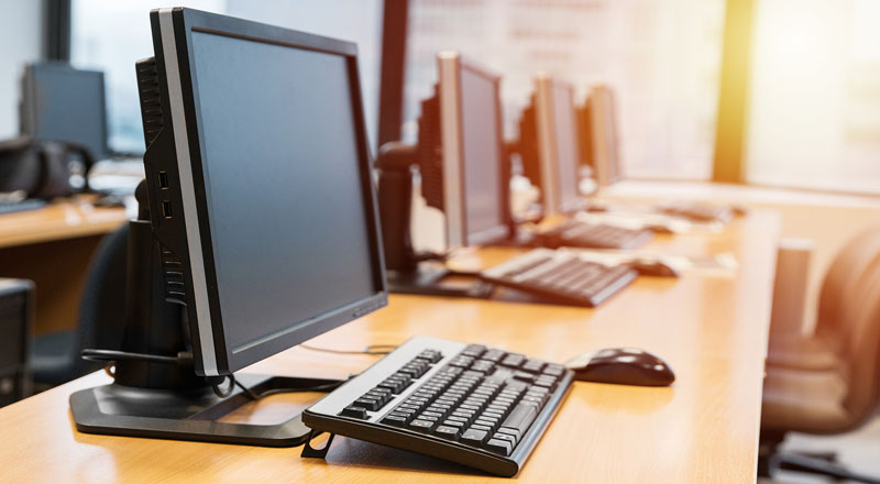 An image of a PC at a desk.
