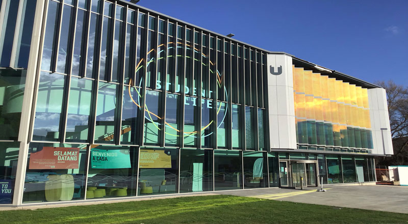 A photo of the Student Life Building, Teesside University, on a bright and clear day.