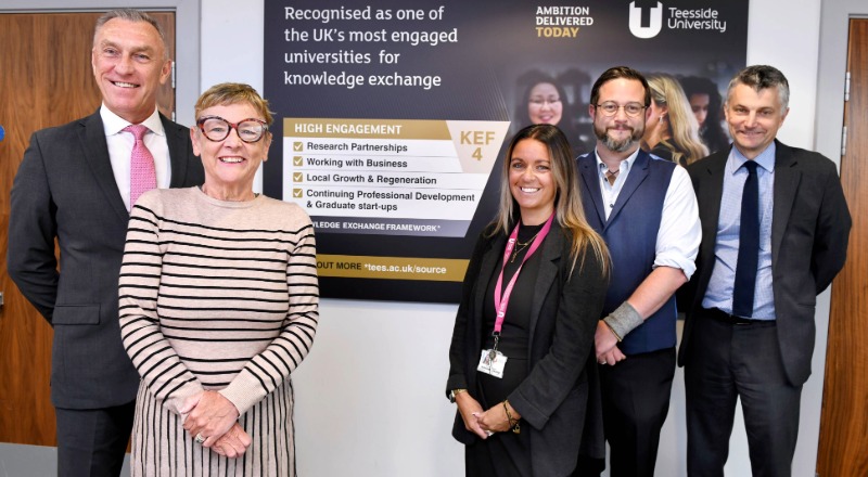 Teesside University Vice-Chancellor Professor Paul Croney OBE (far-left) and Pro Vice-Chancellor (Research and Knowledge Exchange) Professor Stephen Cummings (far-right) with the University's  METIUS team