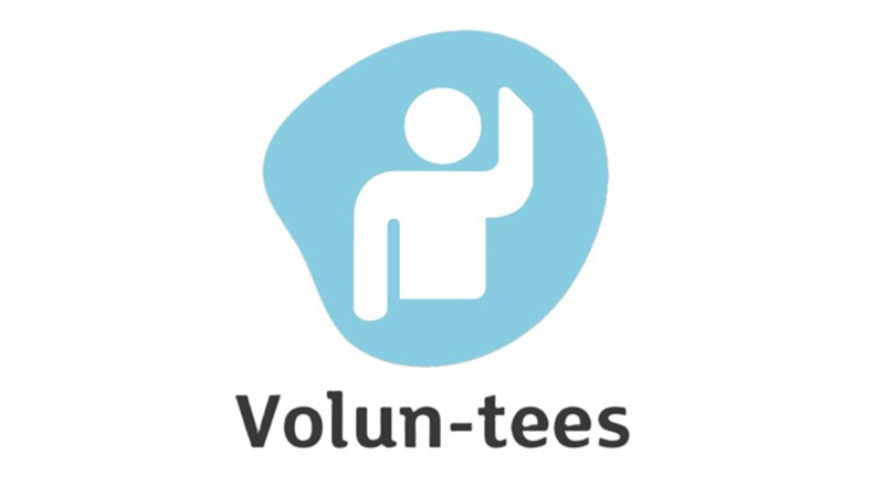 Volun-tees logo. Word 'Volun-tees', with image of a person holding their hand up.