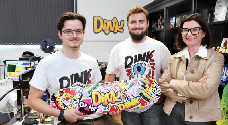Oliver Lloyd and Luke Mills, of Dink, who are both TU (Hons) Computer Games Art graduates, pictured with Steph Bales, Director of Research and Enterprise at Teesside University
