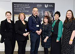 Professor Craig Gaskell (centre), Pro Vice-Chancellor (Enterprise and Knowledge Exchange), with the University’s Associate Deans for Enterprise and Knowledge Exchange, (from left) Charlotte Nichol, Ruth Mitchell, Dr Helen Dudiak, Siobhan Fenton and Professor Vikki Rand (Director of the National Horizons Centre).