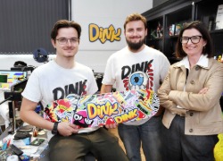Oliver Lloyd and Luke Mills, of Dink, who are both TU (Hons) Computer Games Art graduates, pictured with Steph Bales, Director of Research and Enterprise at Teesside University